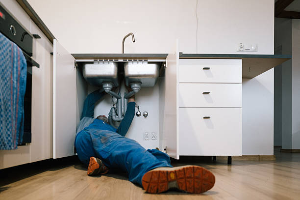 Professional Drain Cleaning technician working in Chestnut Mountain, GA